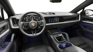 Interior view showing the steering wheel and dashboard of Cayenne E-Hybrid Coupe