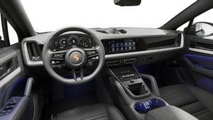 Interior view showing the steering wheel and dashboard of Cayenne S Coupe