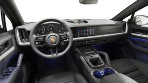Interior view showing the steering wheel and dashboard of Cayenne S Coupe