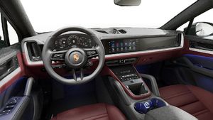 Interior view showing the steering wheel and dashboard of Cayenne S Coupe