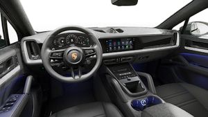 Interior view showing the steering wheel and dashboard of Cayenne S Coupe