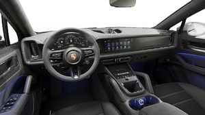 Interior view showing the steering wheel and dashboard of Cayenne GTS Coupe