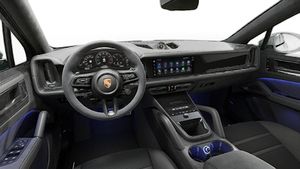 Interior view showing the steering wheel and dashboard of Cayenne GTS Coupe