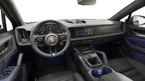 Interior view showing the steering wheel and dashboard of Cayenne GTS Coupe