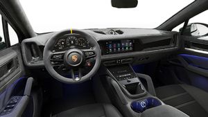 Interior view showing the steering wheel and dashboard of Cayenne Turbo GT