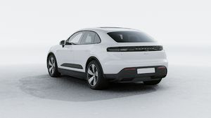 Exterior view of Macan Electric showing the back and left side of the car