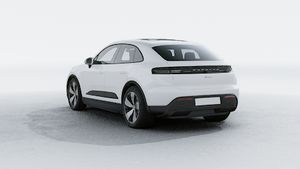 Exterior view of Macan Electric showing the back and left side of the car
