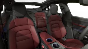 Interior view showing the front seats of Taycan 4