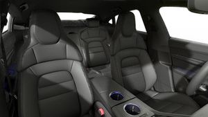 Interior view showing the front seats of Taycan 4