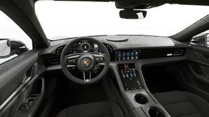 Interior view showing the steering wheel and dashboard of Taycan Turbo GT with Weissach Package