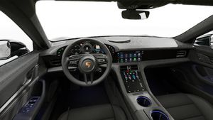 Interior view showing the steering wheel and dashboard of Taycan Black Edition
