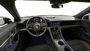 Interior view showing the steering wheel and dashboard of Taycan 4 Black Edition