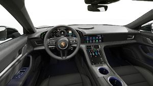 Interior view showing the steering wheel and dashboard of Taycan 4 Cross Turismo