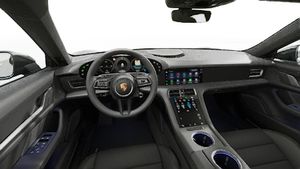Interior view showing the steering wheel and dashboard of Taycan 4 Cross Turismo