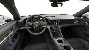 Interior view showing the steering wheel and dashboard of Taycan 4 Cross Turismo