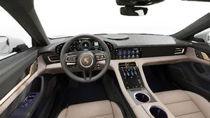 Interior view showing the steering wheel and dashboard of Taycan 4 Cross Turismo