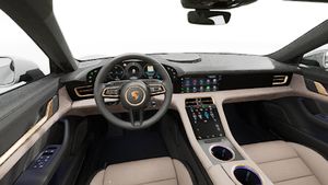 Interior view showing the steering wheel and dashboard of Taycan 4 Cross Turismo