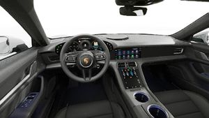 Interior view showing the steering wheel and dashboard of Taycan 4 Cross Turismo