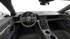 Interior view showing the steering wheel and dashboard of Taycan 4 Cross Turismo