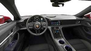 Interior view showing the steering wheel and dashboard of Taycan 4 Cross Turismo