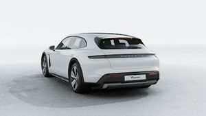 Exterior view of Taycan 4 Cross Turismo showing the back and left side of the car