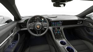 Interior view showing the steering wheel and dashboard of Taycan 4S Cross Turismo