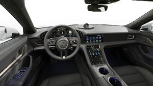 Interior view showing the steering wheel and dashboard of Taycan Turbo Cross Turismo