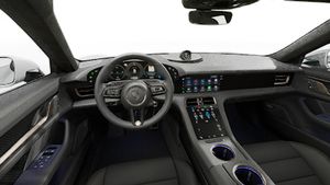 Interior view showing the steering wheel and dashboard of Taycan Turbo S Cross Turismo