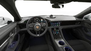 Interior view showing the steering wheel and dashboard of Taycan GTS Sport Turismo