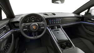 Interior view showing the steering wheel and dashboard of Panamera