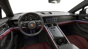 Interior view showing the steering wheel and dashboard of Panamera