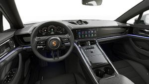 Interior view showing the steering wheel and dashboard of Panamera 4 E-Hybrid
