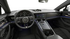 Interior view showing the steering wheel and dashboard of Panamera Turbo E-Hybrid