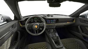 Interior view showing the steering wheel and dashboard of 911 Spirit 70